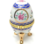 Porseleinen ei, blauw met wit en goud kleur